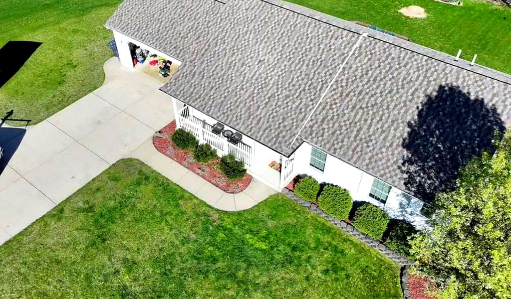 Completed roof replacement on a Michigan ranch home